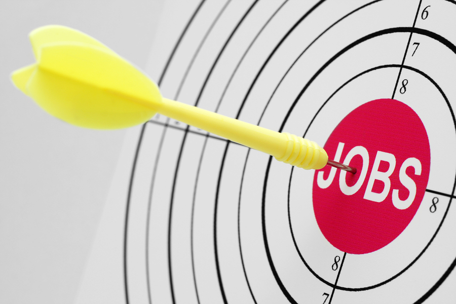Close up of dart on jobs target